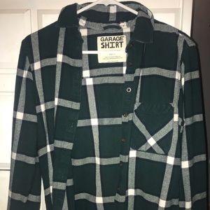 A green, white and gray flannel from garage.